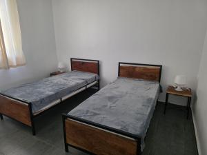 Postel nebo postele na pokoji v ubytování Les Petits Sereres