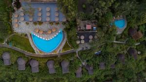 an overhead view of a resort with a swimming pool at Dream Cliff Mountain Resort in Haputale