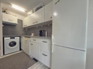 Køkken eller tekøkken på L'Alhambra - Plage à Pied Piscine