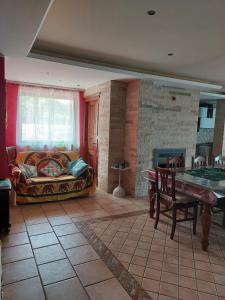 Et opholdsområde på Giardino d'Estate - Villa con piscina