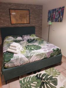 En eller flere senge i et værelse på Giardino d'Estate - Villa con piscina