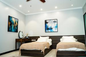 Ένα ή περισσότερα κρεβάτια σε δωμάτιο στο Diamond Light Hotel