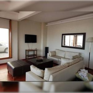 TV a/nebo společenská místnost v ubytování Hotel Horizont