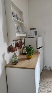 Kuchyň nebo kuchyňský kout v ubytování Al Numero 5