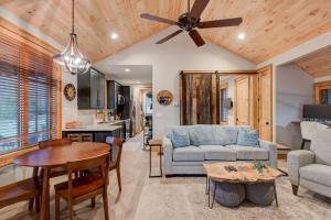 a living room with a couch and a table at Banner Bear in Banner Elk