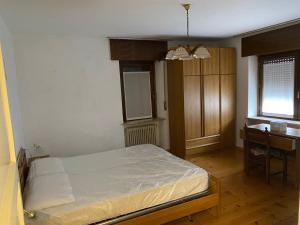 Ένα ή περισσότερα κρεβάτια σε δωμάτιο στο Anna