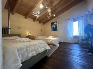 Кровать или кровати в номере La Stellata - Casale Toscano Luxury con piscina +60 фотографий