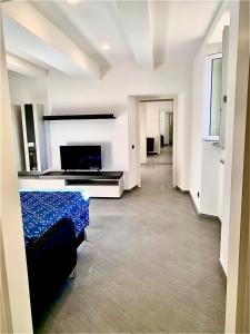 TV a/nebo společenská místnost v ubytování Residenza Caterina