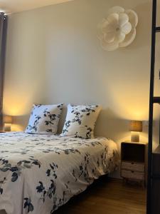 Ένα ή περισσότερα κρεβάτια σε δωμάτιο στο La Suite Haussman