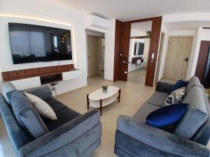 TV a/nebo společenská místnost v ubytování Mirador en Macororo 15, Piso 20