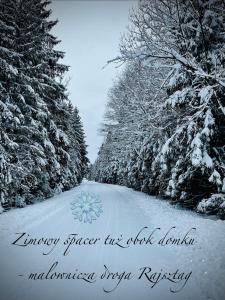 a picture of a snow covered road with trees at ORAWSKA CHATA - domek z balią pod Babią Górą in Zubrzyca Górna +75 photos