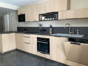 Η κουζίνα ή μικρή κουζίνα στο Le Goulet