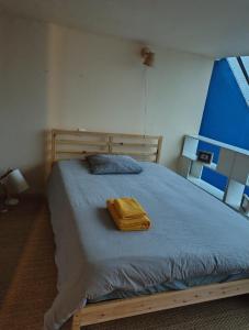 Postel nebo postele na pokoji v ubytování LOFT 2 stations from Paris RER B Laplace