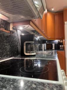 Kuchyň nebo kuchyňský kout v ubytování Pieksämäellä saunallinen kaksio rivitalossa + 5 fotografií