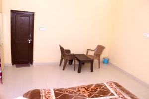 Posezení v ubytování Hostel Home Stay Khajurhao