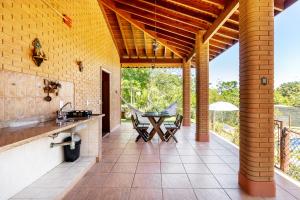 En balkon eller terrasse på Edicula aconchegante privativa em Sousas, Campinas