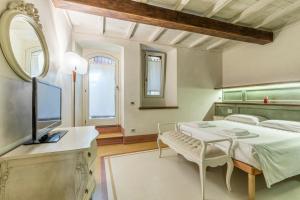 Ένα ή περισσότερα κρεβάτια σε δωμάτιο στο 2 minuti dal Duomo - Parcheggio free a 3 minuti