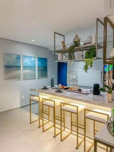 Η κουζίνα ή μικρή κουζίνα στο Apartamento Pé na areia