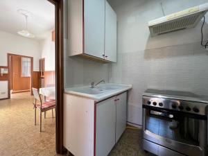 Η κουζίνα ή μικρή κουζίνα στο Villa Sant'Antonio Suite