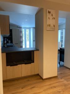 Η κουζίνα ή μικρή κουζίνα στο Le Goulet