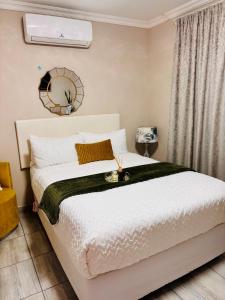 Postel nebo postele na pokoji v ubytování Sunset Heaven + 5 fotografií