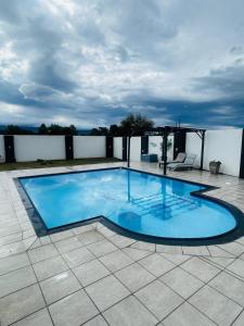 Bazén v ubytování Sunset Heaven nebo v jeho okolí