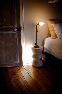 Postel nebo postele na pokoji v ubytování Chez Guilem chambre rose