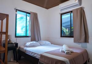 Ένα ή περισσότερα κρεβάτια σε δωμάτιο στο Surf Paradise