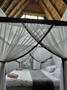 Postel nebo postele na pokoji v ubytování Hakunamatata Country Estate + 35 fotografií