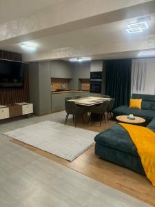 Kuchyň nebo kuchyňský kout v ubytování Vibe apartaments