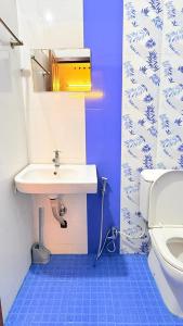 Koupelna v ubytování Comodita Homes