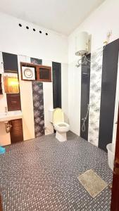 Koupelna v ubytování Comodita Homes + 7 fotografií