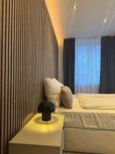 Postel nebo postele na pokoji v ubytování Apartment am Marktplatz mit XXL Garage