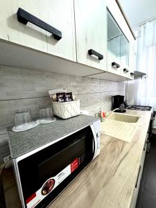 Foto sihtkohas Craiova asuva majutusasutuse Garsoniera moderna, spatioasa, Complex Ferval galeriist