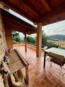 Balkón nebo terasa v ubytování Podere Baloo Country Holiday Home