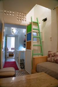 Ένα ή περισσότερα κρεβάτια σε δωμάτιο στο Tayyugt apartment