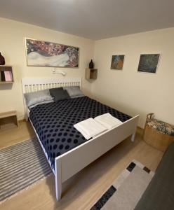 Ένα ή περισσότερα κρεβάτια σε δωμάτιο στο Tokaj-Wine Guesthouse and Spa