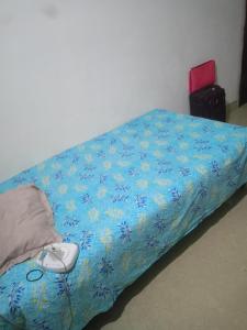 Una cama o camas en una habitación de Borahs homestay