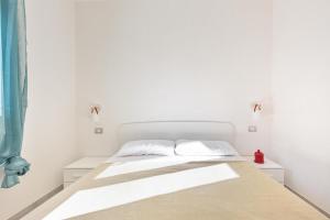 Postel nebo postele na pokoji v ubytování Appart NUOVO Sorgenti Sup by Salento Prime