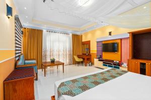 TV a/nebo společenská místnost v ubytování AIDA The Queen Palace