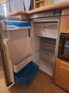 Kuchyň nebo kuchyňský kout v ubytování Proboost Arctic Center Cosy Caravan + 41 fotografií