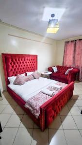 Ένα ή περισσότερα κρεβάτια σε δωμάτιο στο The Joseph Sport Property