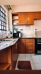 Η κουζίνα ή μικρή κουζίνα στο The Joseph Sport Property