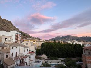 a view of a city with houses and mountains at La Casa del Valle in Blanca