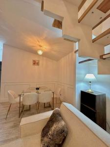 a living room with a table and a dining room at HOLLY HOUSE Casa privada completa in Chachapoyas +19 photos