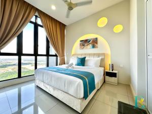 a bedroom with a large bed and large windows at D'Pristine Suites by RR JBcity in Nusajaya +218 photos