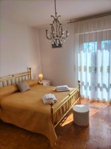 Ένα ή περισσότερα κρεβάτια σε δωμάτιο στο House Tramonto D'oro