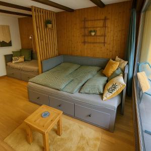 Ένα ή περισσότερα κρεβάτια σε δωμάτιο στο Studio alpin & central Ovronnaz avec parking