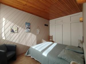 Ένα ή περισσότερα κρεβάτια σε δωμάτιο στο Homency - Résidence de l'Oisans C0 +10 φωτογραφίες