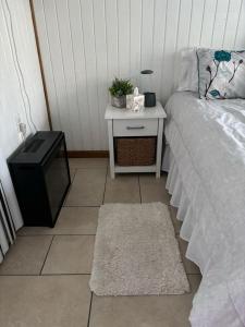 Ένα ή περισσότερα κρεβάτια σε δωμάτιο στο Guesthouse near Fort Myers Beach, Sanibel and Captiva islands